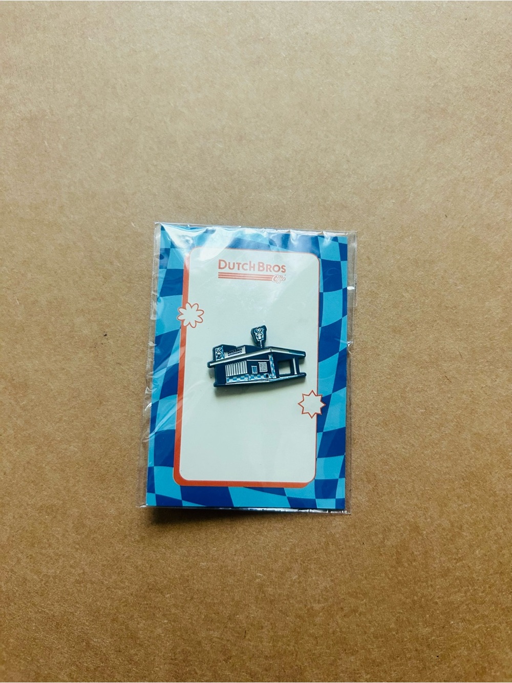 Dutch Bros coffee stand blue lapel pin